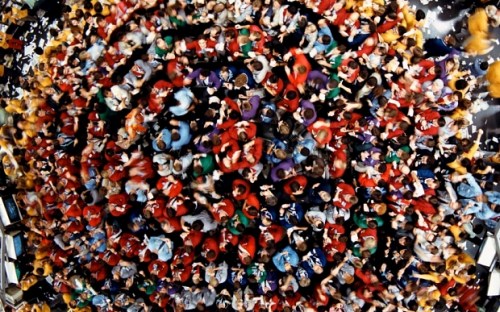 The S&P 500 trading pit is pictured from overhead at the Chicago Mercantile Exchange in Chicago, Illinois in this late 1980s handout photo. July 6 will mark the end of more than eight decades of open-outcry grain futures trading at the landmark Chicago Board of Trade Building, the art deco masterpiece housing the raucous trading pits that came to be seen as a symbol of turbulent capitalism reshaping the world. CME is closing the pits due to the rise of electronic trading. Now, the vast space once filled with thousands of arm-waving, hoarse-voiced traders, runners and clerks will be home to as-yet unknown new inhabitants lured, perhaps, by a super-fast, sophisticated telecommunications network, or the retro charm of 10 octagonal pits - with steps up the outside and then down into an arena-like space in the middle - where trading was conducted. REUTERS/CME Group/Handout via Reuters ATTENTION EDITORS - THIS PICTURE WAS PROVIDED BY A THIRD PARTY. REUTERS IS UNABLE TO INDEPENDENTLY VERIFY THE AUTHENTICITY, CONTENT, LOCATION OR DATE OF THIS IMAGE. FOR EDITORIAL USE ONLY. NOT FOR SALE FOR MARKETING OR ADVERTISING CAMPAIGNS. NO ARCHIVES. NO SALES. THIS PICTURE IS DISTRIBUTED EXACTLY AS RECEIVED BY REUTERS, AS A SERVICE TO CLIENTS. TPX IMAGES OF THE DAY